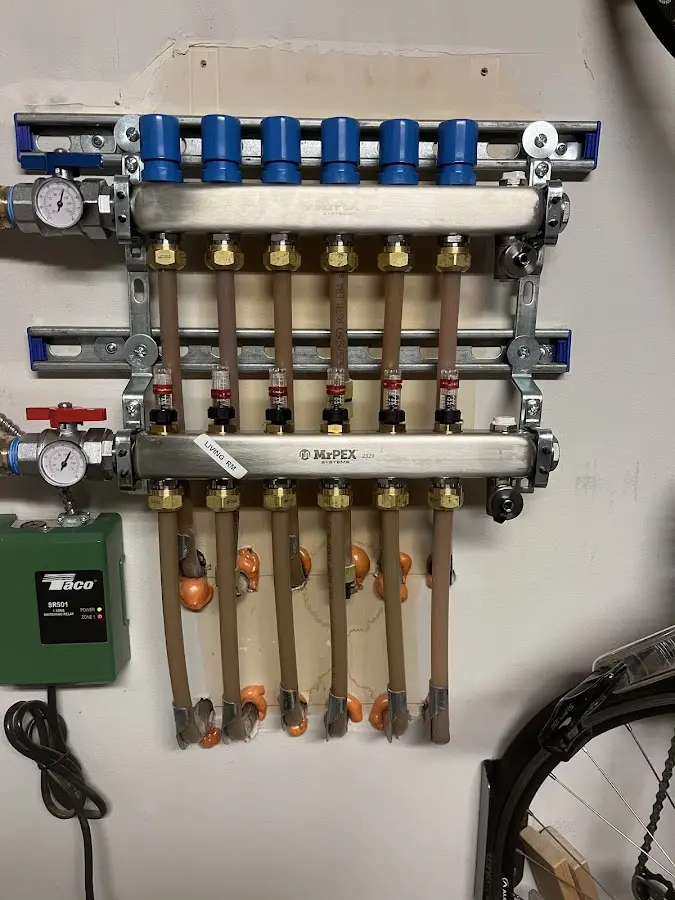 Plumber performing Water Heater Repair at a residential property in Sleepy Hollow